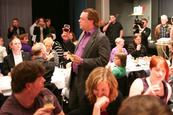 Rick Falkvinge celebrating with Swedish Pirate Party after EU Parliament win.